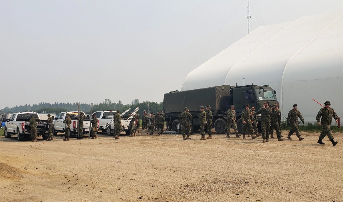 Canadian Armed Forces members arriving at the Deep Creek Complex in Yellowhead County on June 12, 2023.