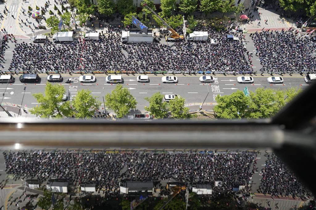 Members of the Korean Confederation of Trade Unions gather to attend a rally on May Day in Seoul, South Korea, Monday, May 1, 2023.