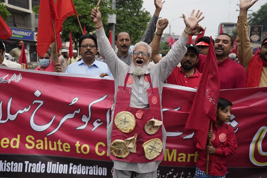 Activists of Pakistan’s trade Union Federation shout slogans during a May Day rally to mark International Labour Day in Lahore, Pakistan, Monday, May 1, 2023.