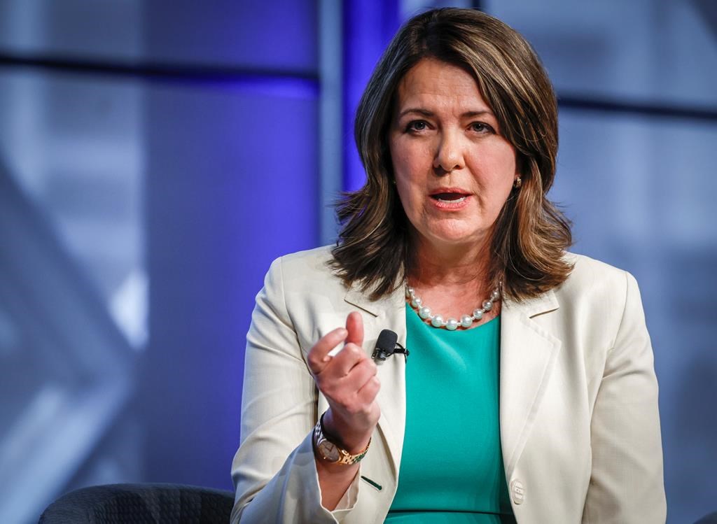 Alberta Premier Danielle Smith gestures as she speaks at an economic forum in Calgary, Alta., Tuesday, April 18, 2023.