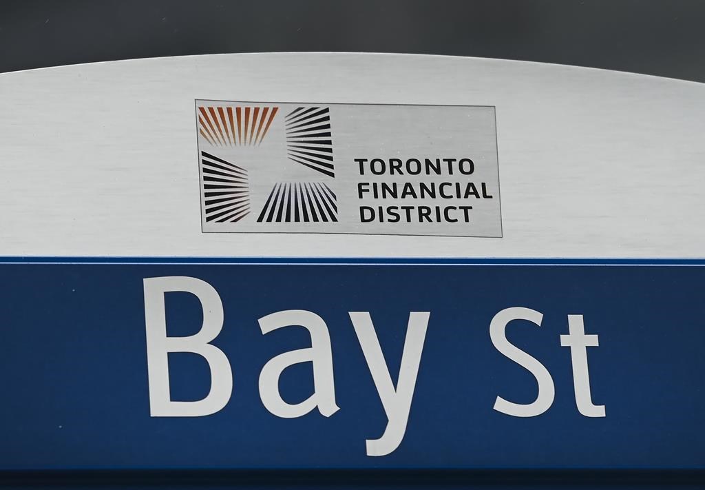 A street sign along Bay Street in Toronto's financial district is shown on Tuesday, January 12, 2021. THE CANADIAN PRESS/Nathan Denette.