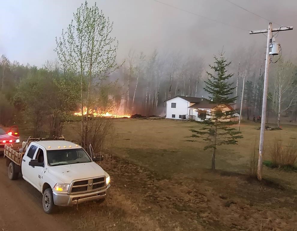 A Métis settlement, shown in this handout image provided by Brad Desjarlais, devastated by an out-of-control wildfire remains at risk as hot and dry conditions in Alberta's forecast threaten to worsen an already intense fire season. THE CANADIAN PRESS/HO-Brad Desjarlais 
**MANDATORY CREDIT **.
