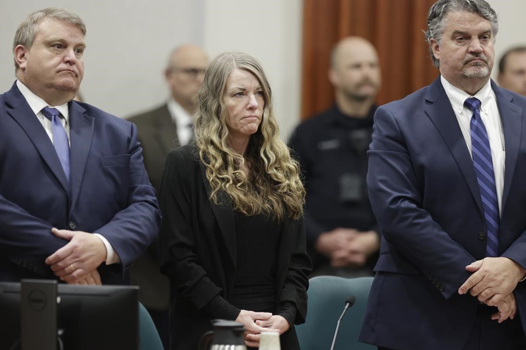 Lori Vallow Daybell stands and listens as the jury's verdict is read at the Ada County Courthouse in Boise, Idaho on Friday May 12, 2023. The Idaho jury convicted Daybell of murder in the deaths of her two youngest children and a romantic rival, a verdict that marks the end of a three-year investigation that included bizarre claims of zombie children, apocalyptic prophesies and illicit affairs.