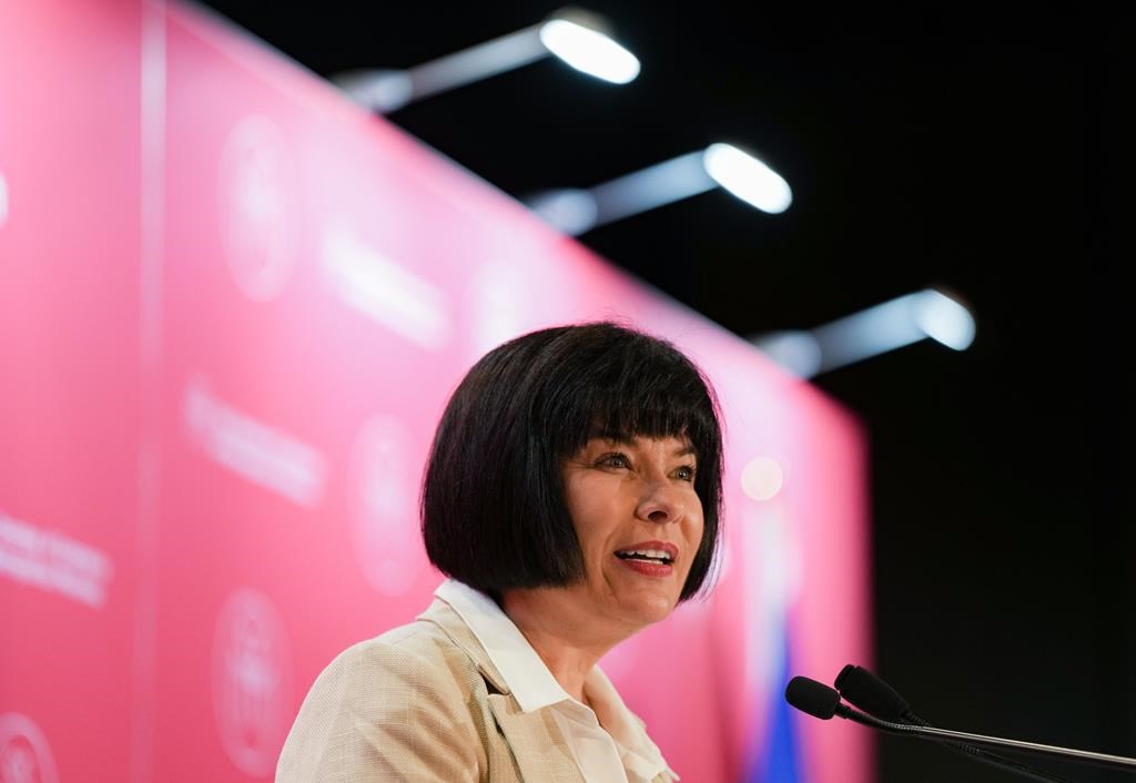Official Languages Minister Ginette Petitpas Taylor addresses the Montreal Chamber of Commerce, in Montreal, Monday, May 8, 2023. The House of Commons has passed third reading of a bill that aims to enshrine a francophone immigration program into law. THE CANADIAN PRESS/Christinne Muschi.