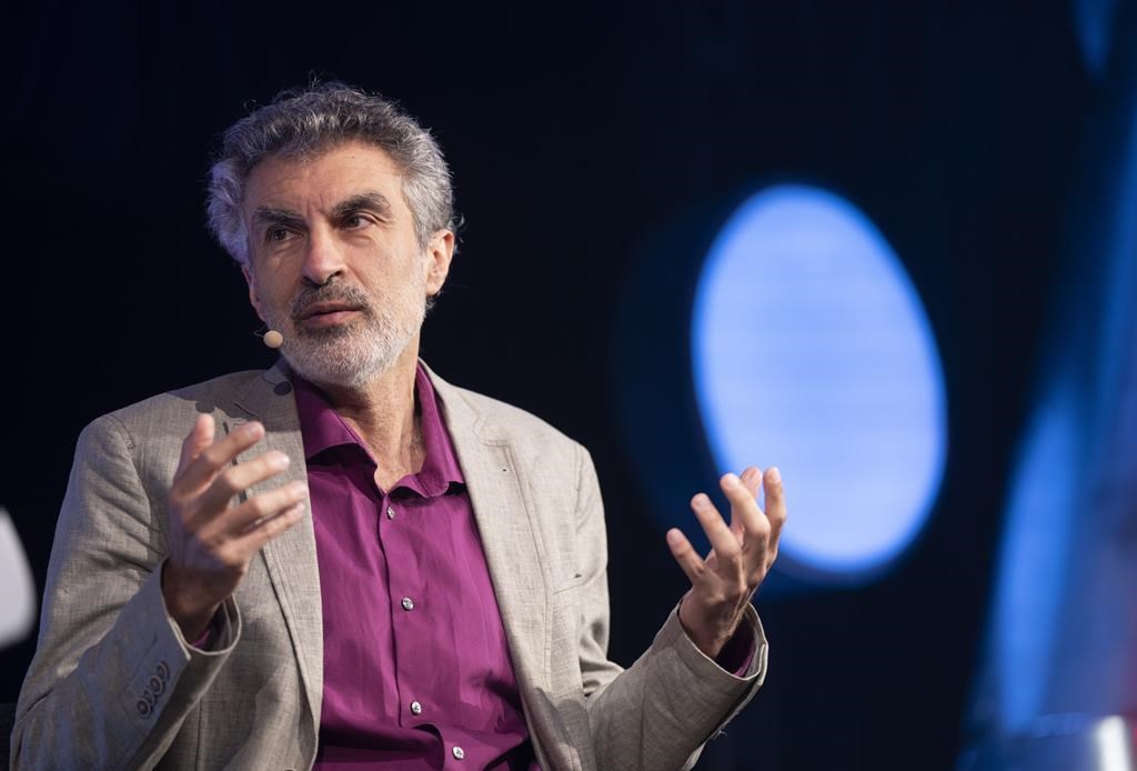 Yoshua Bengio, founder and scientific director, Mila-Quebec AI Institute, discusses artificial intelligence, democracy and the future of civilization at the C2MTL conference on May 24, 2023, in Montreal. THE CANADIAN PRESS/Christinne Muschi