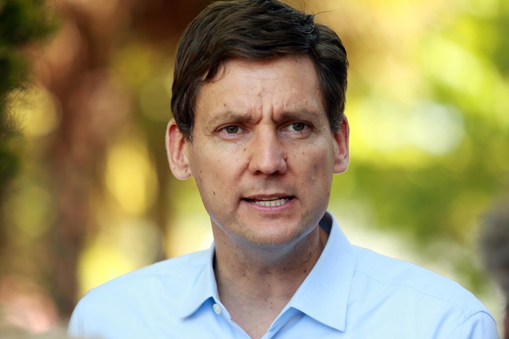 Premier David Eby answers questions from the media in Langford, B.C., on Thursday, May 25, 2023.