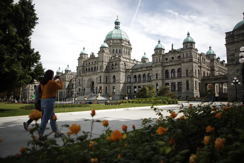 The B.C. Legislature in Victoria, B.C. is shown on Wednesday, June 10, 2020. The B.C. Prosecution Service says it has named a special prosecutor in a case involving a New Westminster school board candidate who was appointed a government adviser at the beginning of May.THE CANADIAN PRESS/Chad Hipolito.