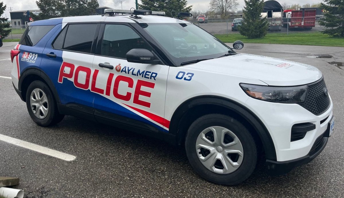 An Aylmer Police Service vehicle parked on a cloudy day.