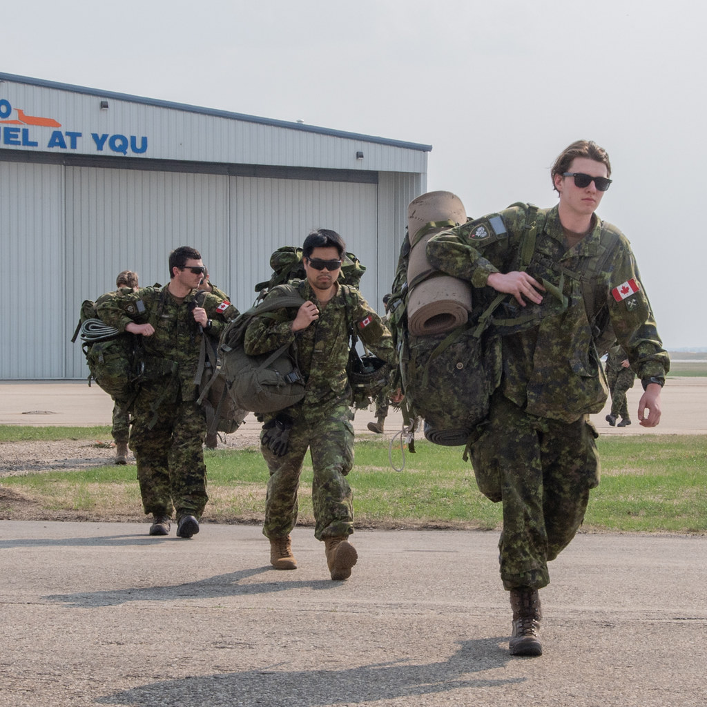 Members of the 3rd Battalion, Princess Patricia’s Canadian Light Infantry arrive aboard a CC-130J Hercules in Grande Prairie, Alberta, in support of Operation LENTUS 23-01 on May 5, 2023. Operation LENTUS is the Canadian Armed Forces (CAF) response to natural disasters in Canada.