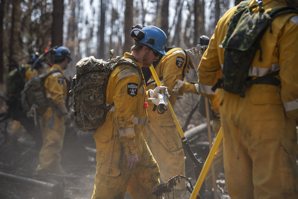 Members from the 41 Canadian Brigade Group (CBG) alongside The Alberta Wildfire and the local firefighters, participate in fire prevention operations in Drayton Valley, Alberta, on May 14, 2023, in support of Operation LENTUS 23.