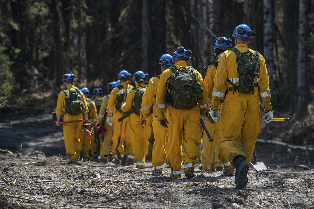 Members from the 41 Canadian Brigade Group (CBG) alongside The Alberta Wildfire and the local firefighters, participate in fire prevention operations in Drayton Valley, Alberta, on May 14, 2023, in support of Operation LENTUS 23.