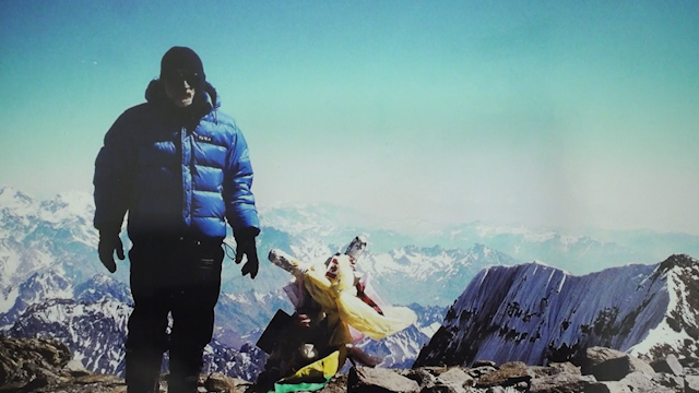 Alan climbing a mountain