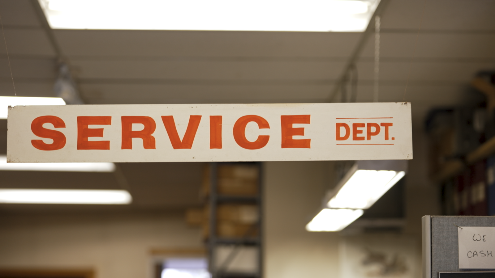 Service sign at American Electronics, a family-owned repair shop in Toronto.