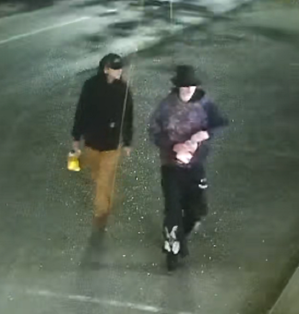 CCTV footage shows two suspects with what appears to be a yellow jerry can in the area of the burl late Wednesday night.