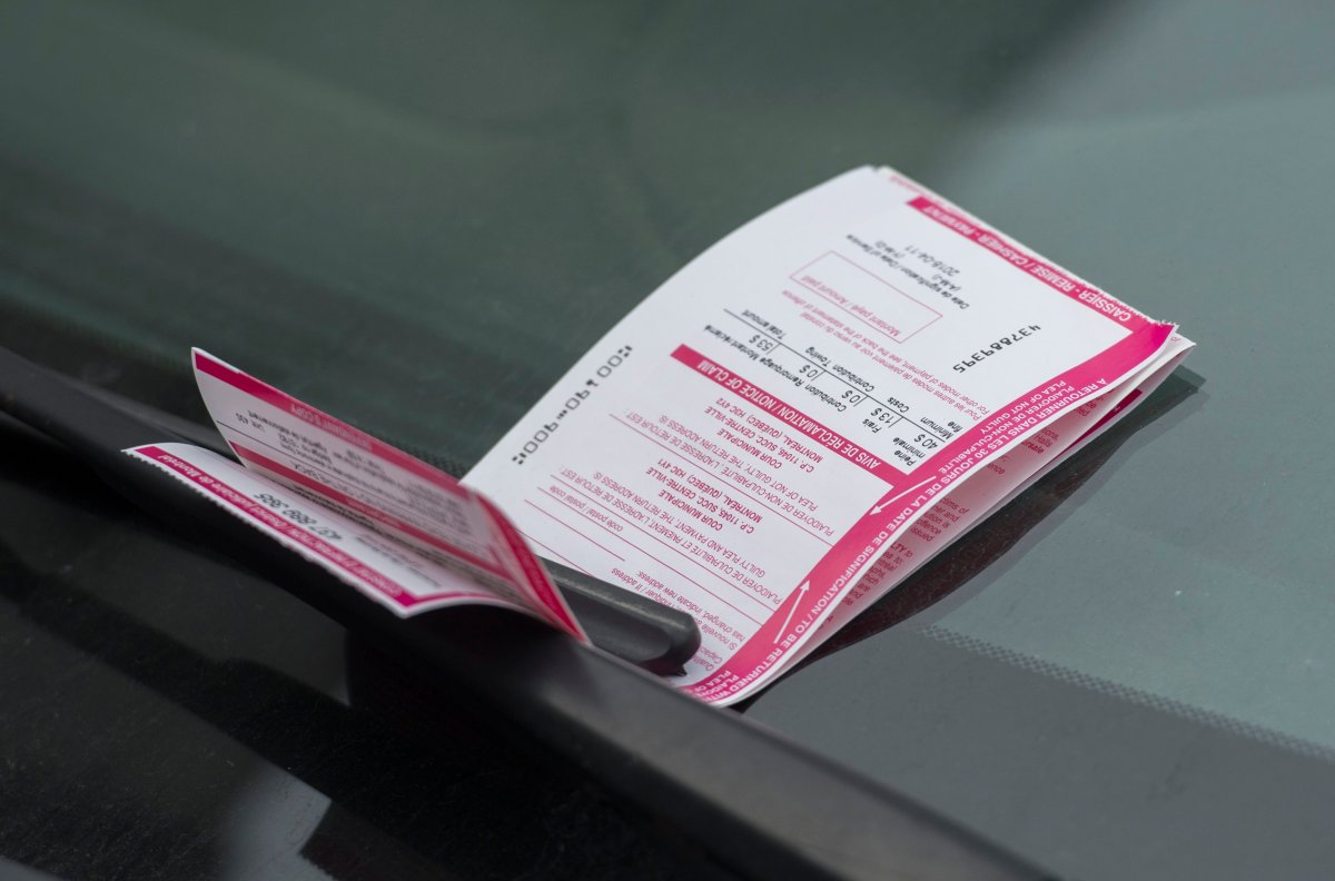 A parking ticket is shown on a car in Montreal, Wednesday, April 11, 2018. 