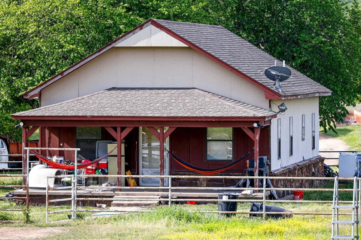 The property where seven bodies were discovered on Monday is pictured in Henryetta, Okla., on Wednesday, May 3, 2023.