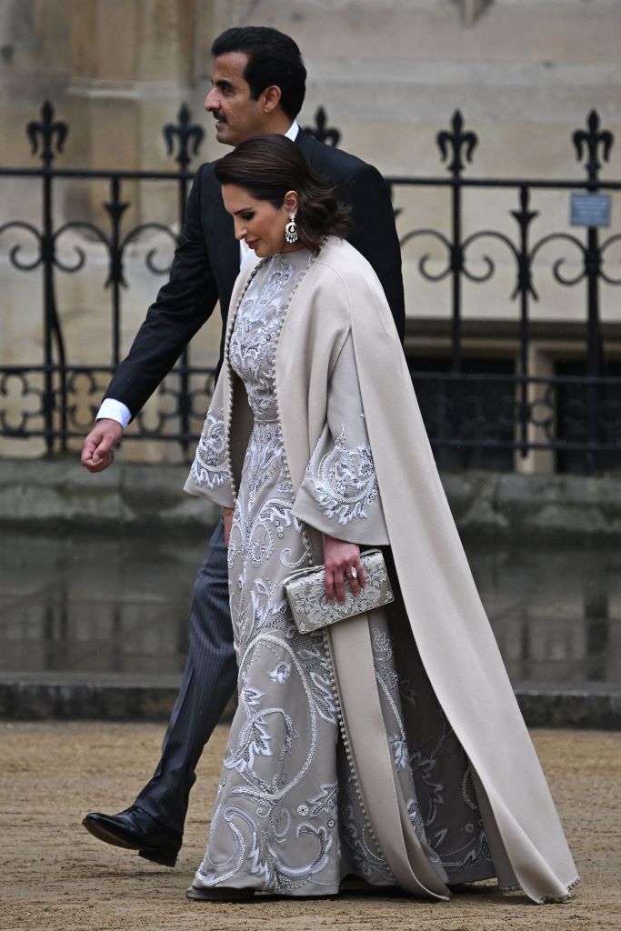 Sheikh Tamim ibn Hamad Al Thani and his wife Tamim bin Hamad Al Thani arrive at Westminster Abbey in central London on May 6, 2023, ahead of the coronations of Britain's King Charles III and Britain's Camilla, Queen Consort.