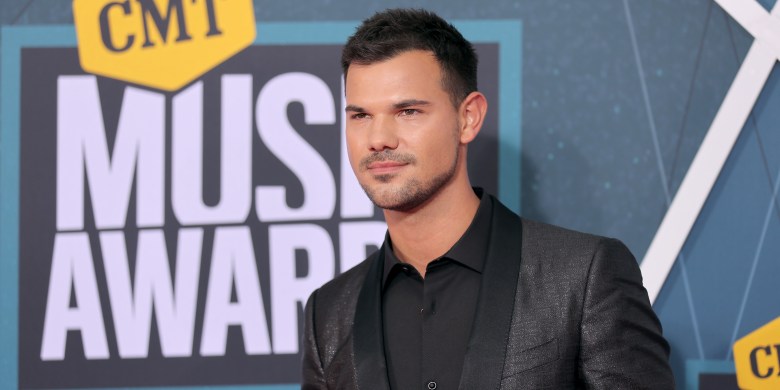 Taylor Lautner Jokes He’s 'Praying' For John Ahead Of Speak Now Re-Release
