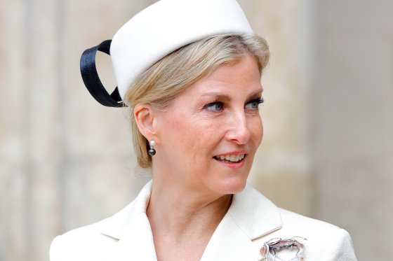 Sophie, Duchess of Edinburgh, in a white cat and white hat. There is a black ribbon on the hat.