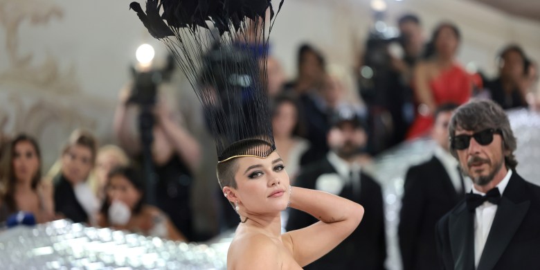 Florence Pugh Shows Off Shaved Head In Feathery Met Gala Look