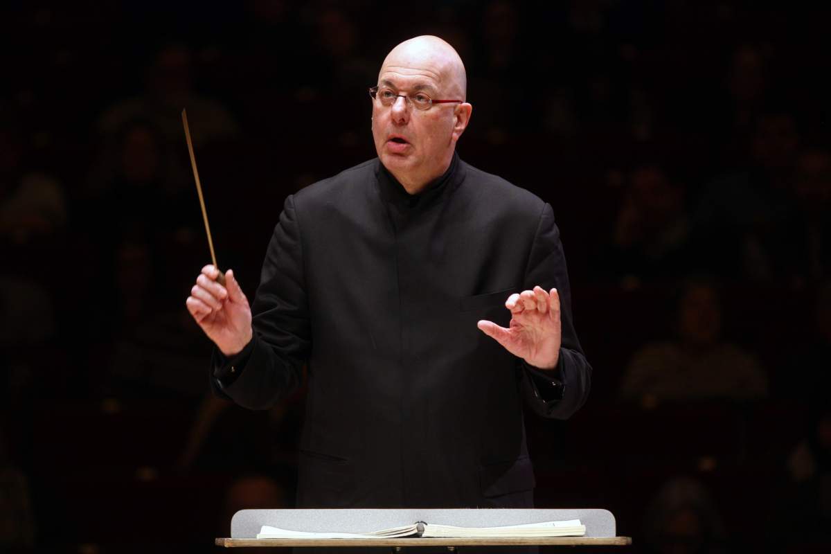 Leon Botstein conducting an orchestra.