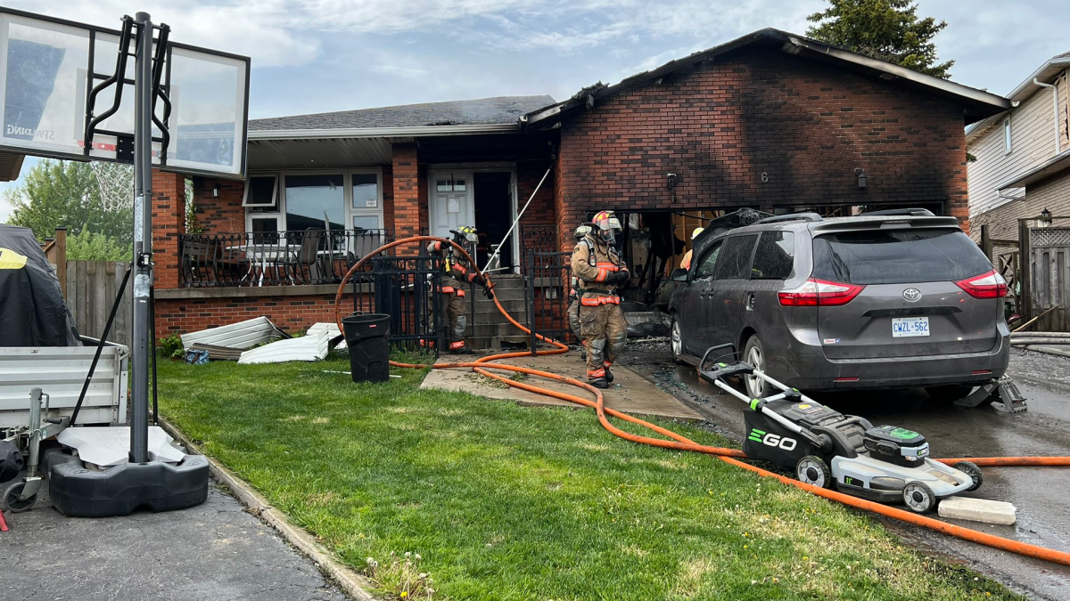 Firefighters at a home on Nina Court on the Mountain in Hamilton Ont. battling a blaze at a care home May 13, 2023.