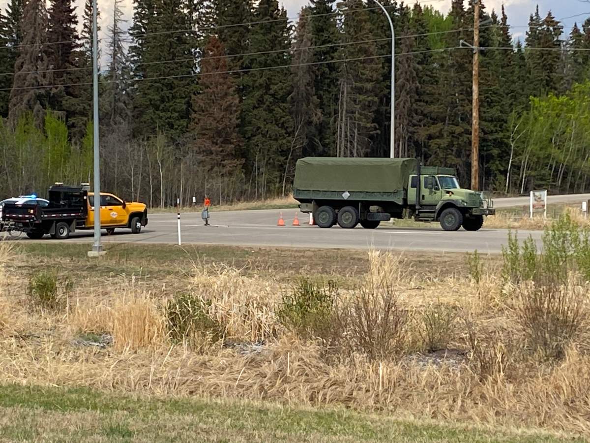 Members of the Canadian Armed Forces arriving at the wildfire in Brazeau County near Drayton Valley, Alta. on Wednesday, May 10, 2023.