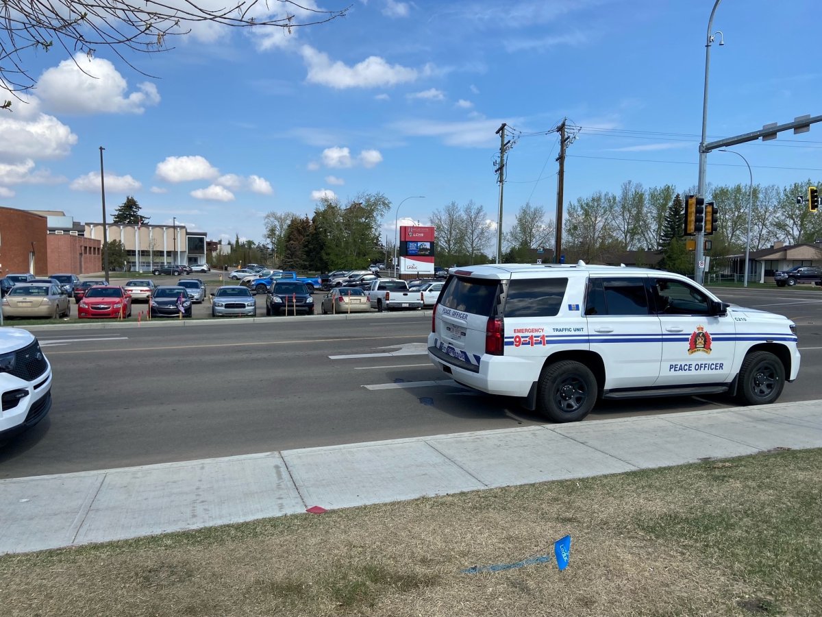 Peace officer cruisers outside of Leduc Composite High School May 10, 2023. Officers were investigating a bomb threat.