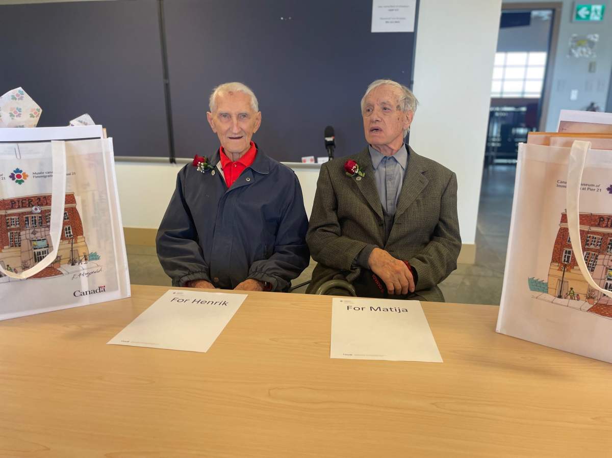 Ziernfeld and Sedej sit at a table reserved for them at the Canadian Museum of Immigration at Pier 21. The two were given a private tour of the museum on Friday.