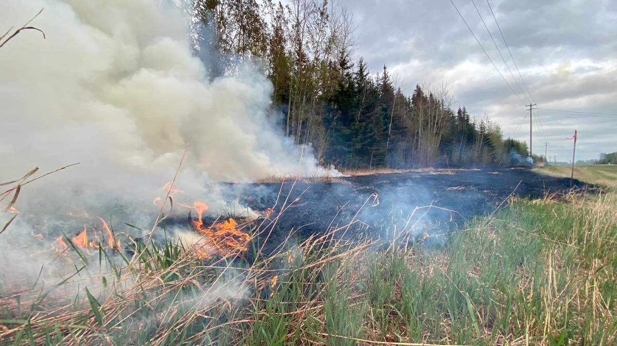 Fire near Highway 986 in Northern Alberta on Sunday, May 7, 2023.