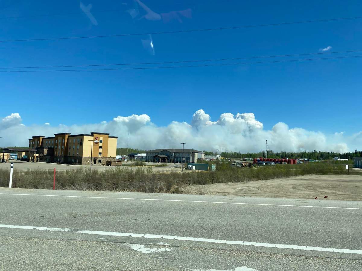 Wildfire smoke billows up near Fox Creek, Alta. May 6, 2023.