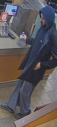Toronto police released an image of the suspect wanted in relation to the investigation around It was around 4:45 a.m. on May 18 when a man reportedly walked up to a drive-thru window near Sheppard Avenue East and Yorkland Boulevard.
