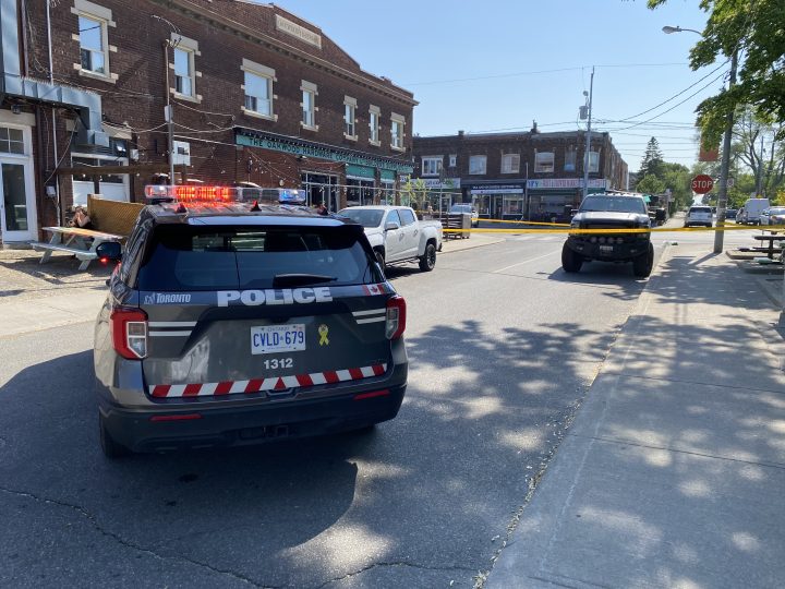 Toronto police on the scene of a collision that sent a female pedestrian to hospital on Tuesday, May 30, 2023.