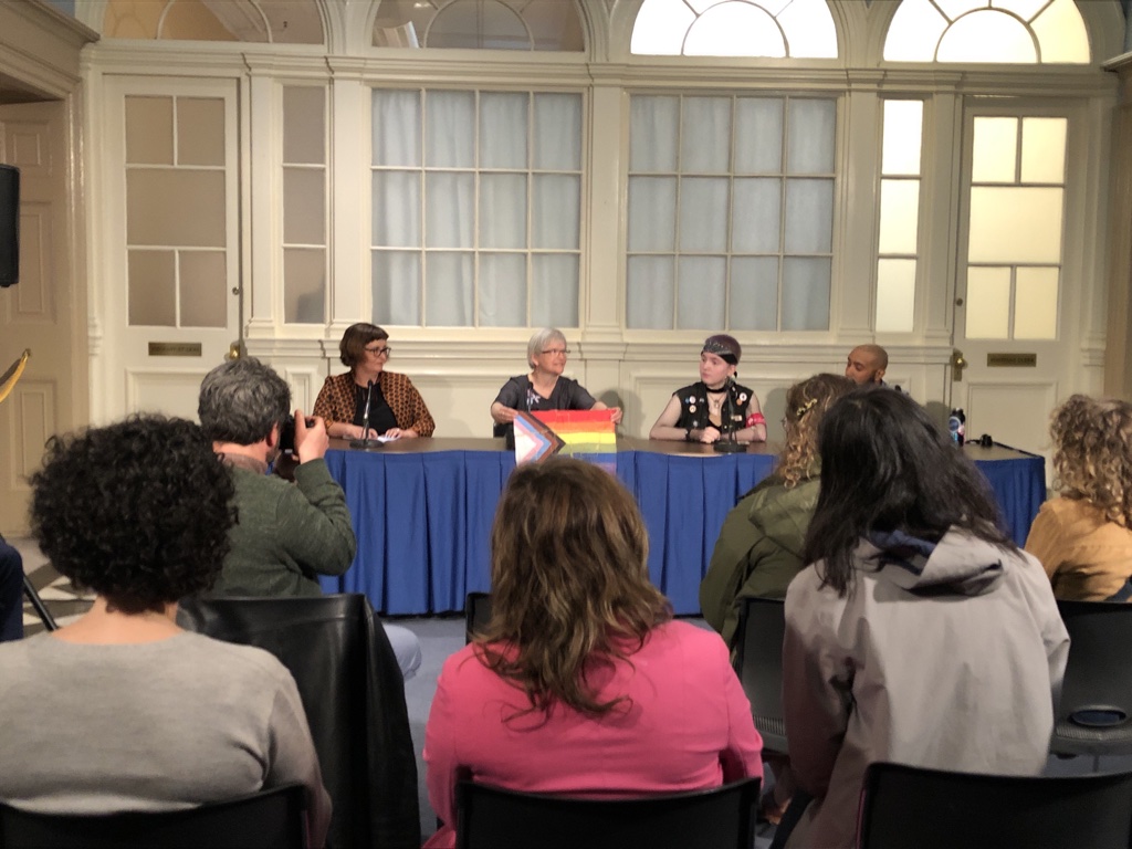 Litke displays the re-stitched flag to those in attendance at Wednesday’s press conference.