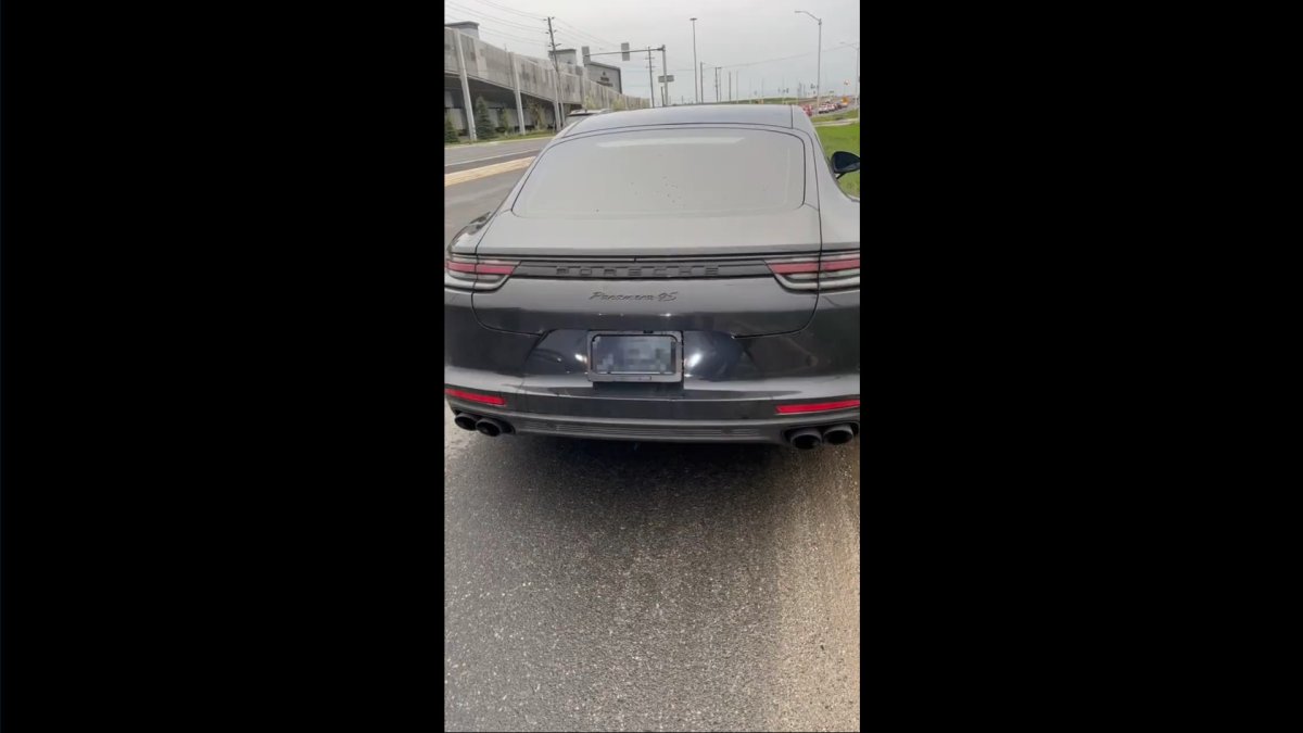 Halton police charged the owner of a high-end sports car for concealing his licence plate via a remote-controlled shield.
