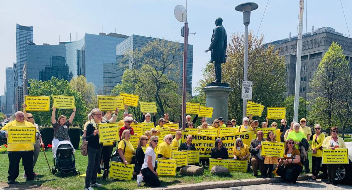 Residents gather at Queen’s Park asking for a moratorium on the planned closure of the ER. (Joyce Webster photo).