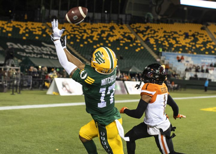 B.C. Lions' Garry Peters (1) chases Edmonton Elks' Dillon Mitchell (17) as he makes the catch for the touchdown during first half CFL action in Edmonton, Alta., on Friday October 21, 2022.