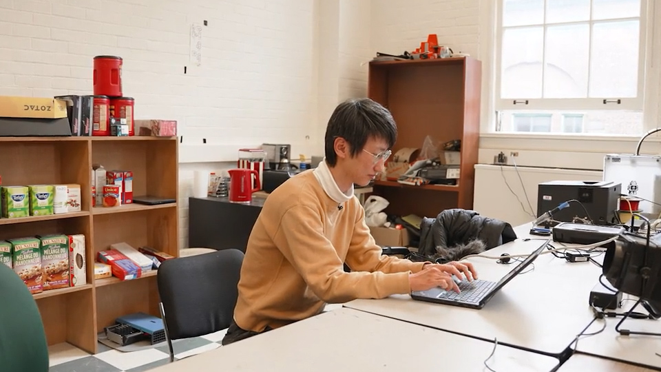 Robotics student, Nan Ling working on Salt, another social robot