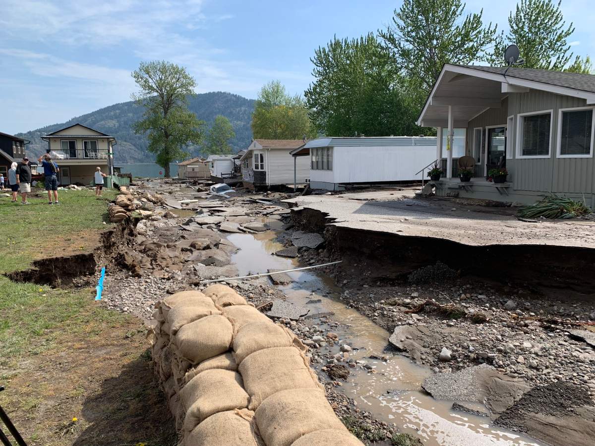 The aftermath of flooding in Parker Cove on Wednesday, May 3, 2023. Falcon Ave. is washed out.