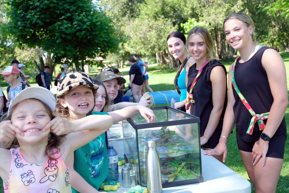 Elementary school students participate in the Sponge Bog Frog activity centre led by students from St. Peter Catholic Secondary School to teach students how pollutants can harm frogs.