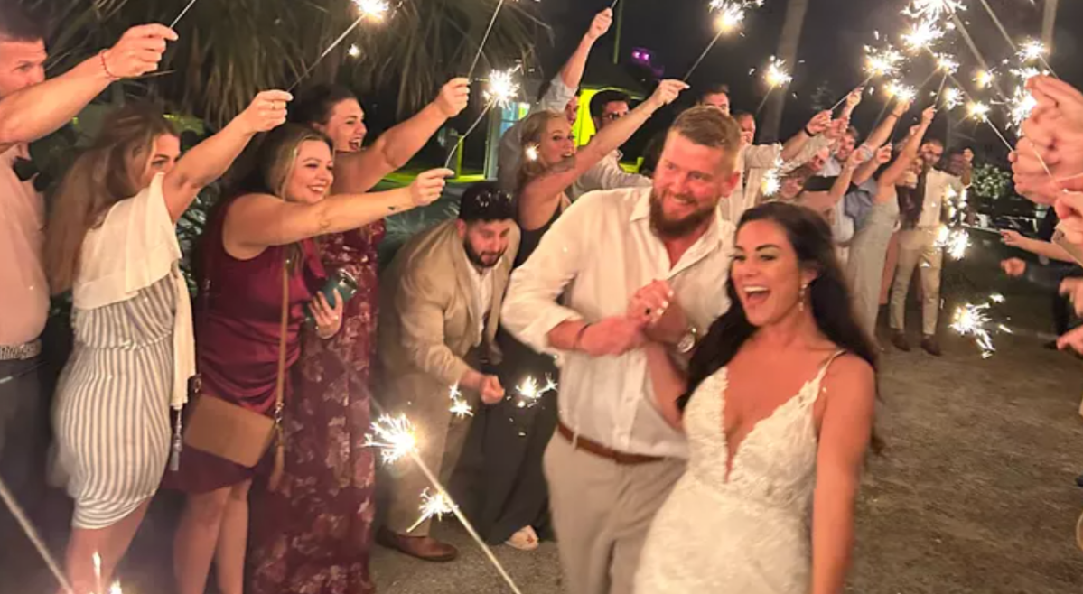 Screengrab from a GoFundMe page set up for Samantha Miller and Aric Hutchinson after their golf cart was rammed by a drunk driver hours after their wedding.