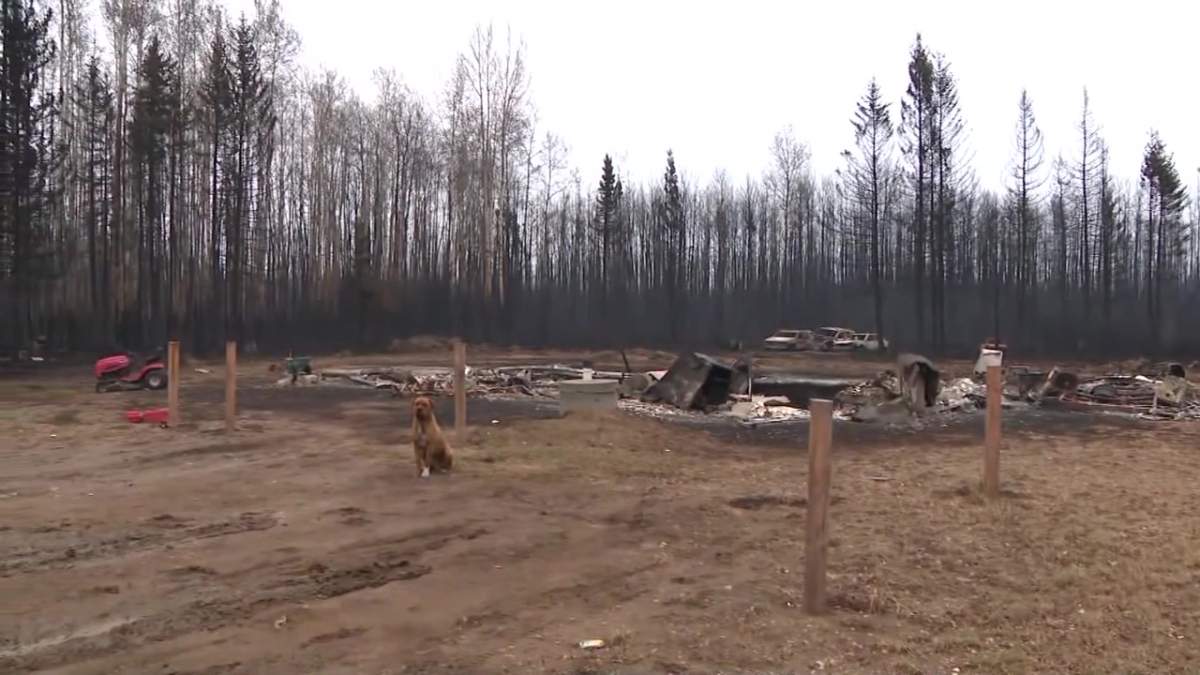 The remains of a house destroyed by wildfire in East Prairie Metis Settlement, Alta. on Friday, May 5, 2023.