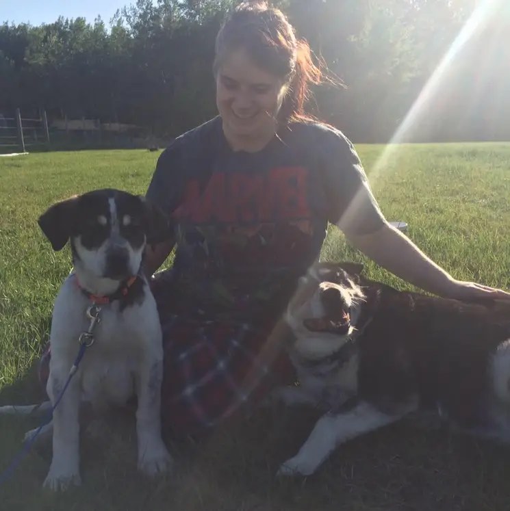 Tiffany and her dog. Jardine family farm in Entwistle, Alta., burned in wildfire on April 29, 2023.