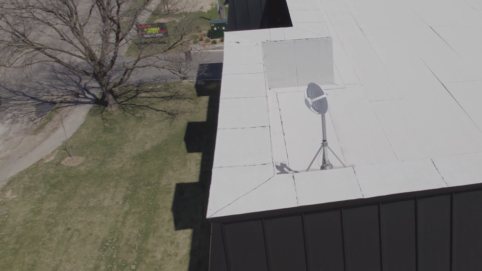 Satellite on top of Ressam Gardens, which will provide free wifi to the park across the street where residents will be allowed to roam and play