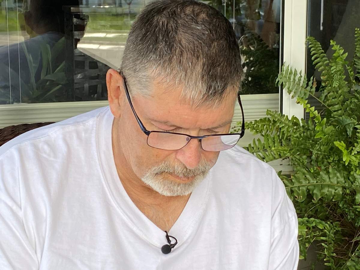 Bob Choquette looks over correspondence from Manulife