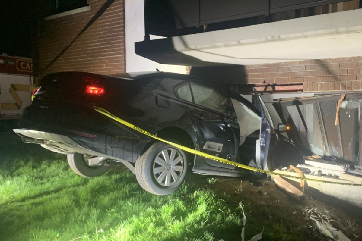 A teenager was driving the car on private property when they lost control of the vehicle and it hit the building, according to Waterloo Regional Police.
