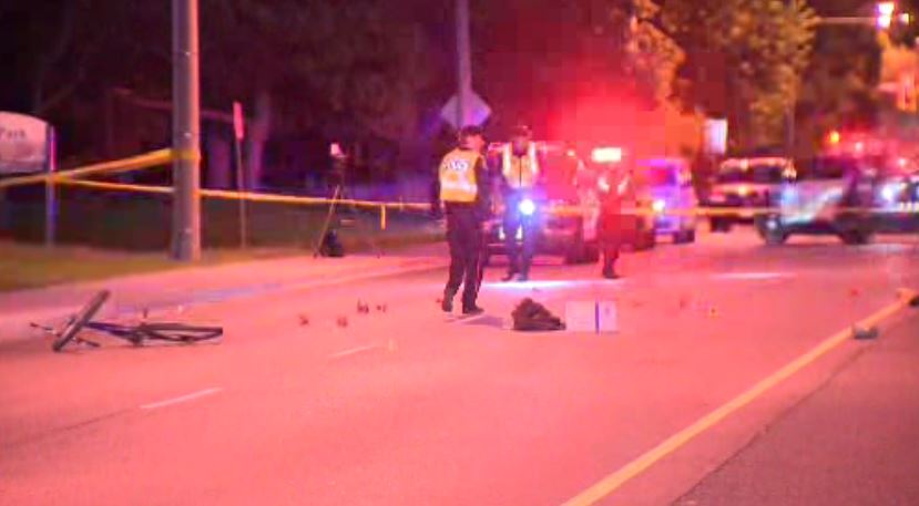 Police on scene after a cyclist was struck on Scarlett Road on May 28, 2023.