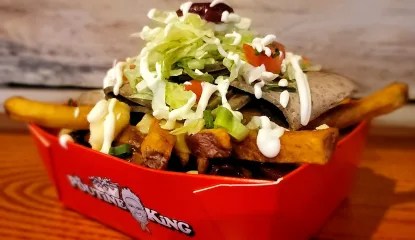 Fresh cut fries, cheese curds, rich gravy, topped with grilled lamb, caramelized onions, garnished with chopped lettuce, diced tomatoes, pickled beets, green onions and a drizzle of tzatziki and donair sauce.