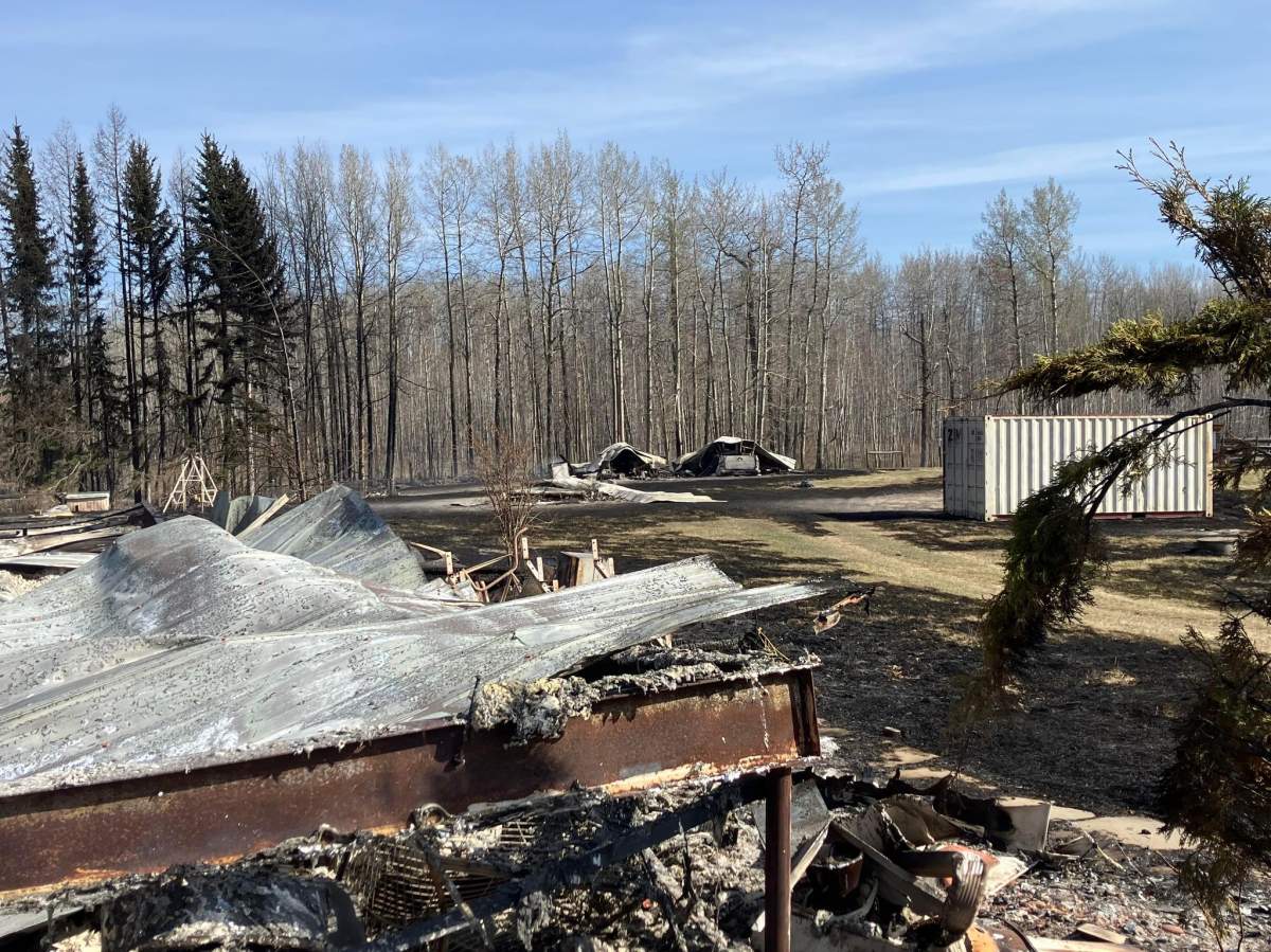 Jardine family farm in Entwistle, Alta., burned in wildfire on April 29, 2023.