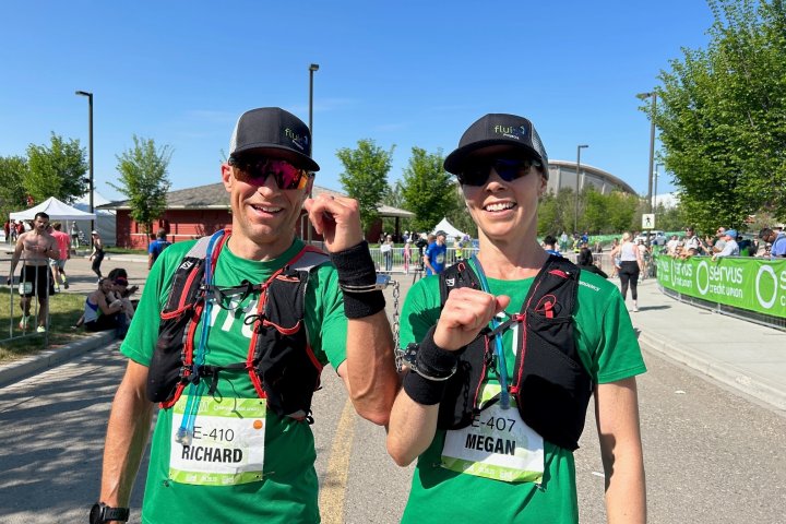 Calgary couple breaks world record by running a marathon handcuffed
